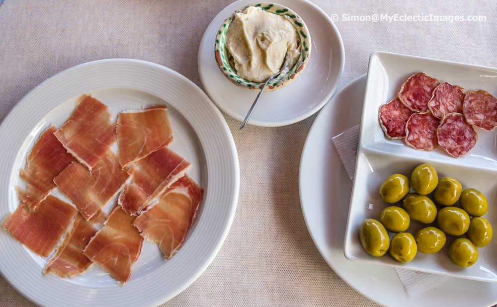 An Appetizer of Serrano Ham, Salami and Olives