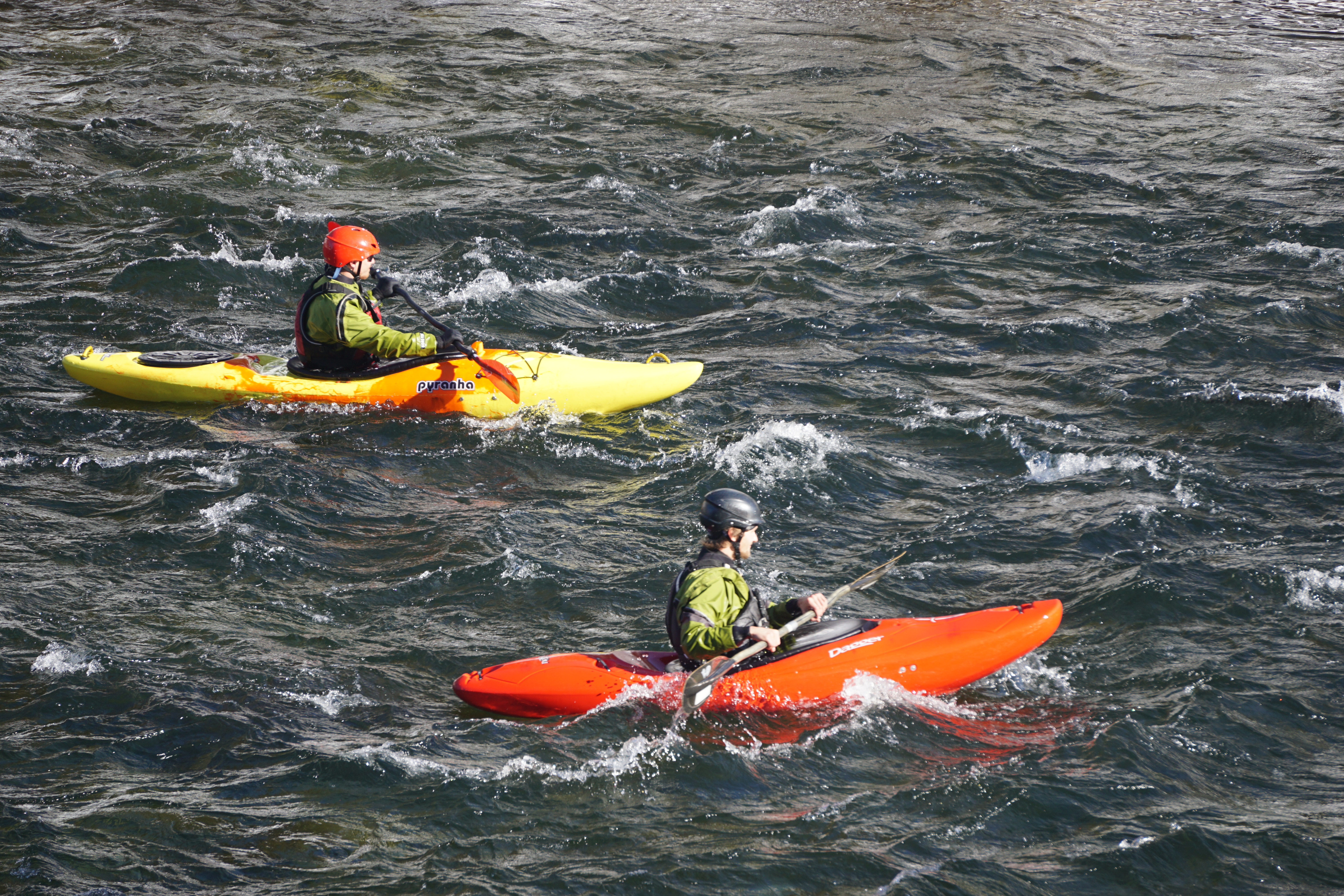 kayakers passing the grand river lodge