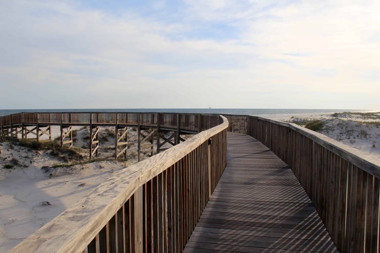 Long Wood Pier Leading Down to the Beach from Beach Club Resort and Spa