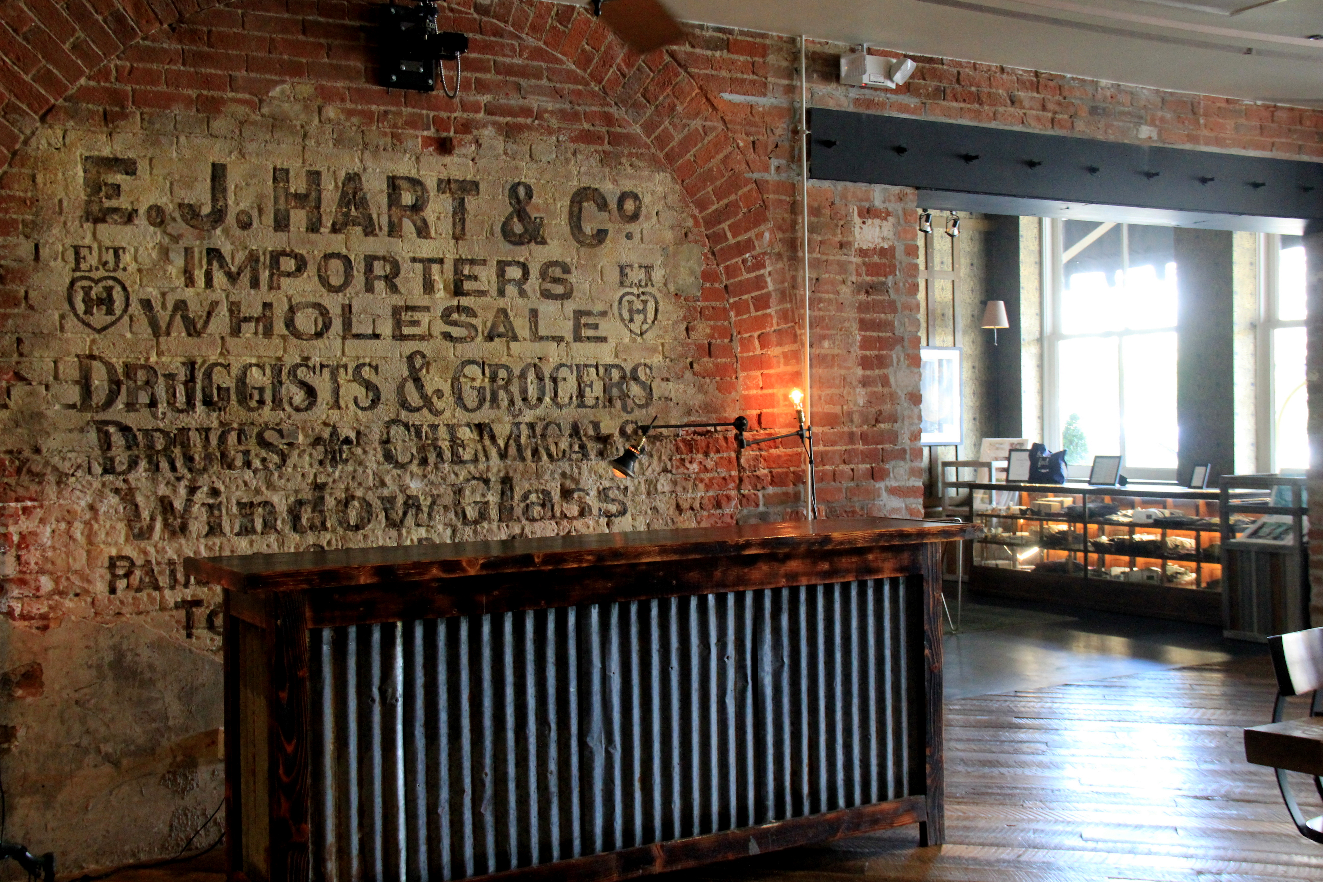 Original painted brick sign at Old 77 Hotel and Chandlery