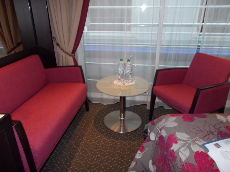 Sitting Area with Table - Water is Replenished Throughout the Cruise